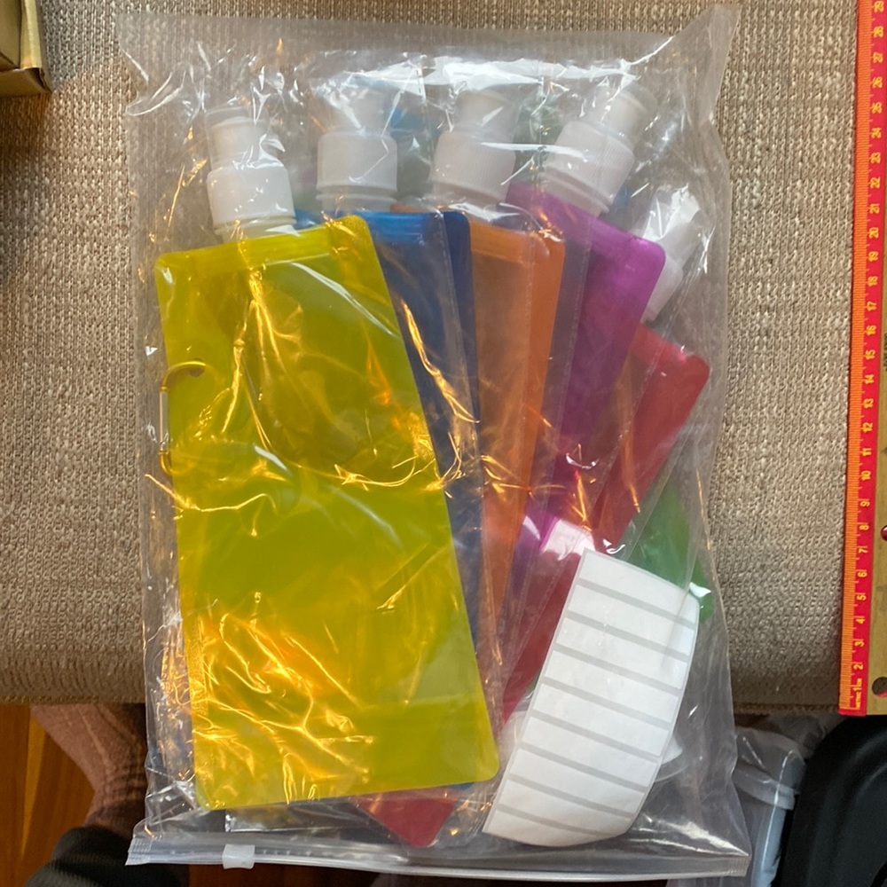BNWT portable travel liquid pouches